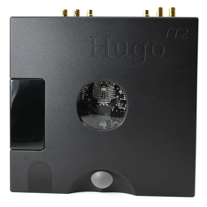 Chord Electronics Hugo TT2 headphone amplifier and DAC with sleek black front panel, multiple input ports, and volume control.