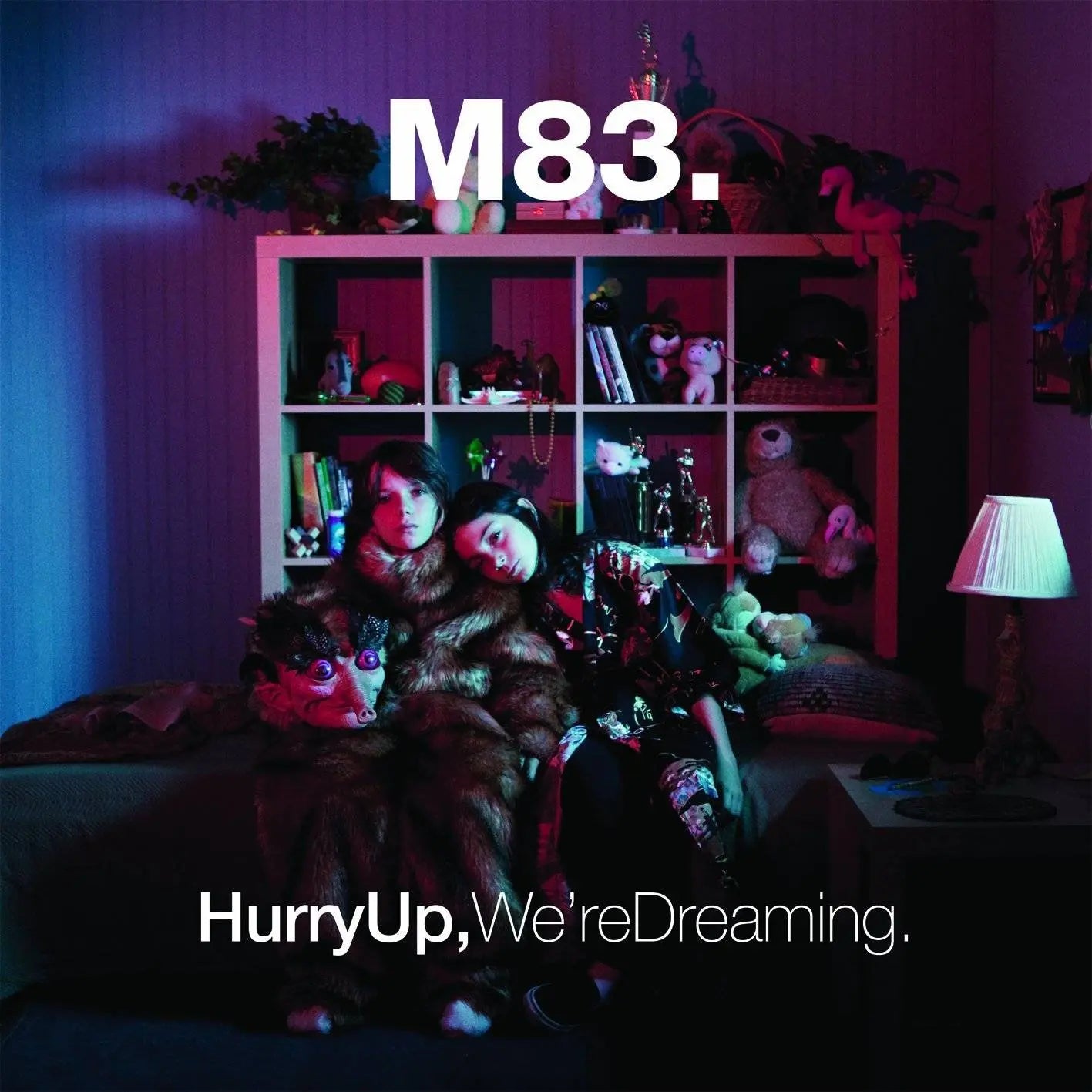 M83 Hurry Up We're Dreaming vinyl 2LP with clear pink and clear blue vinyl, featuring artwork and record labels.