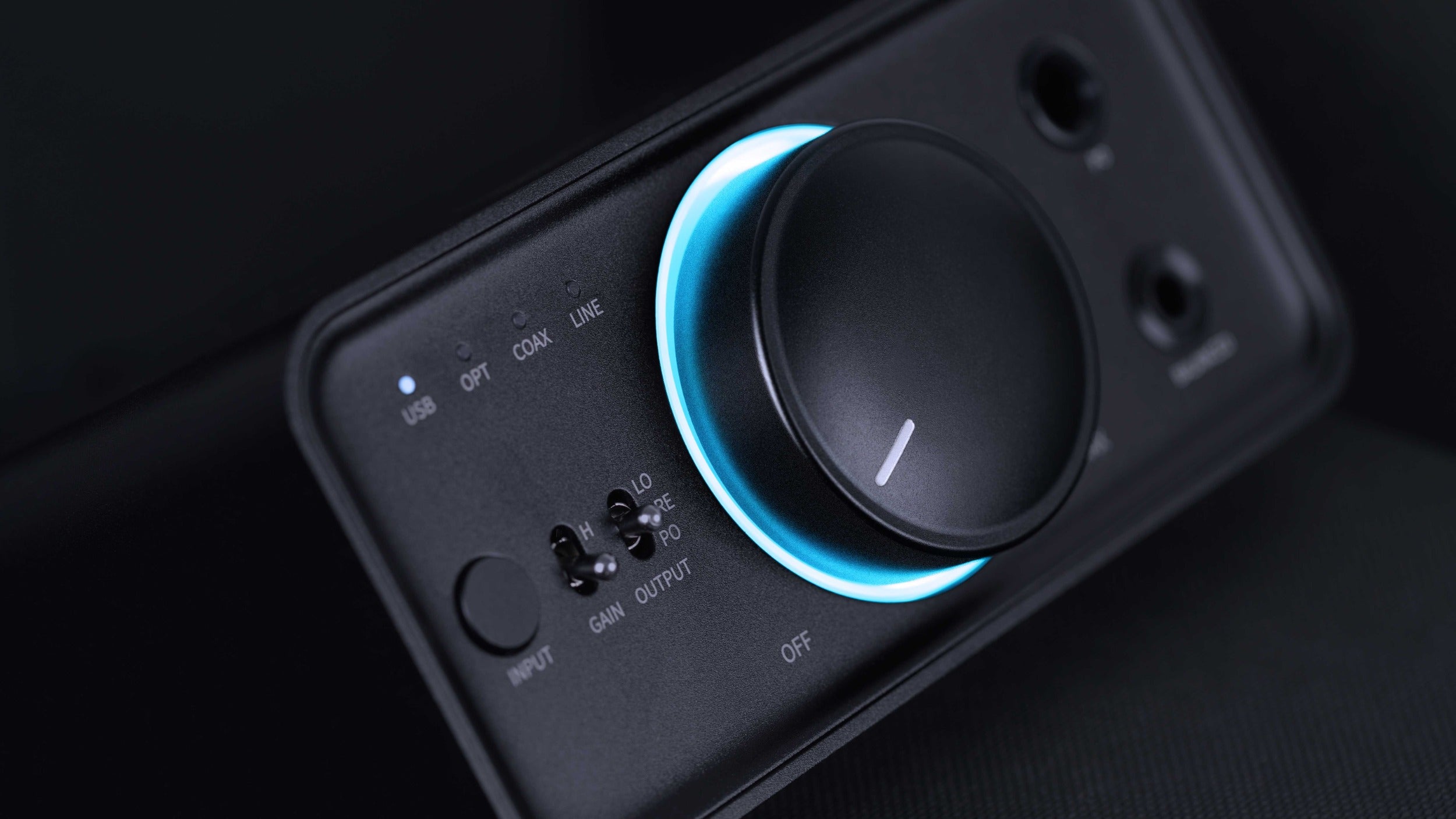 FiiO K7 BT headphone amplifier and DAC with multiple input ports and sleek black design, showcasing its front panel and controls.