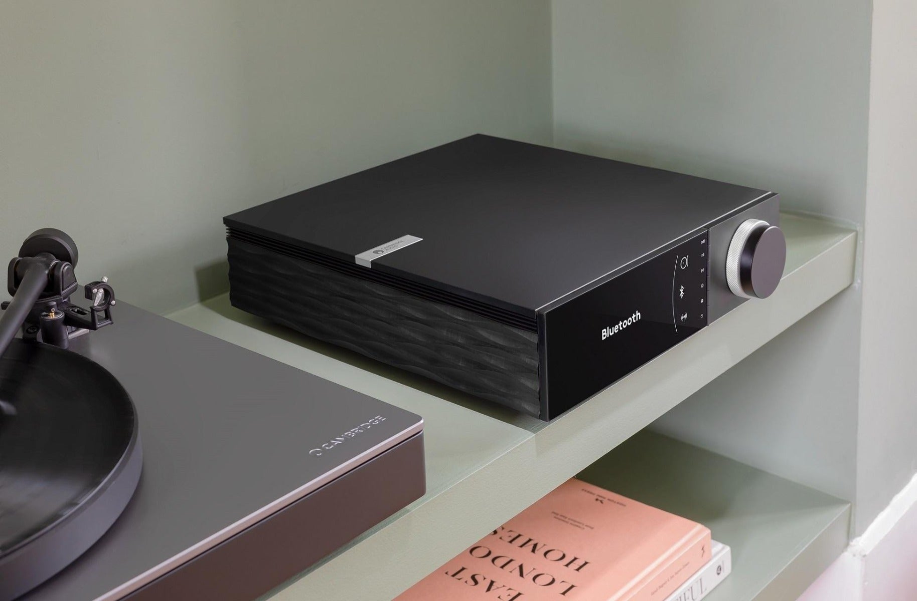 Cambridge Audio EVO 150 stereo amplifier with sleek design and control knobs, showcasing the modern audio equipment.