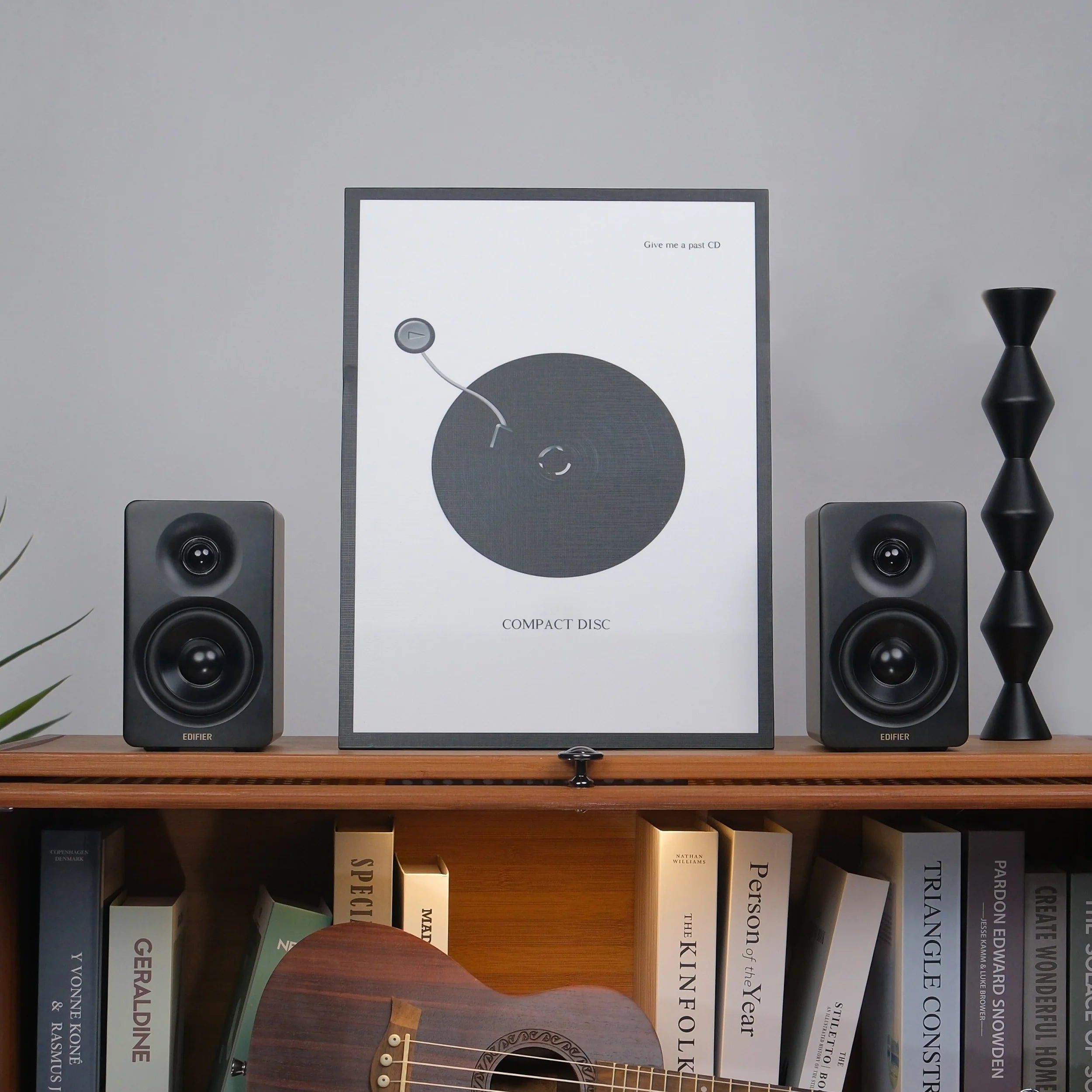 Edifier M60 desktop speakers with black finish, featuring two speaker units and control knobs on the front panel.