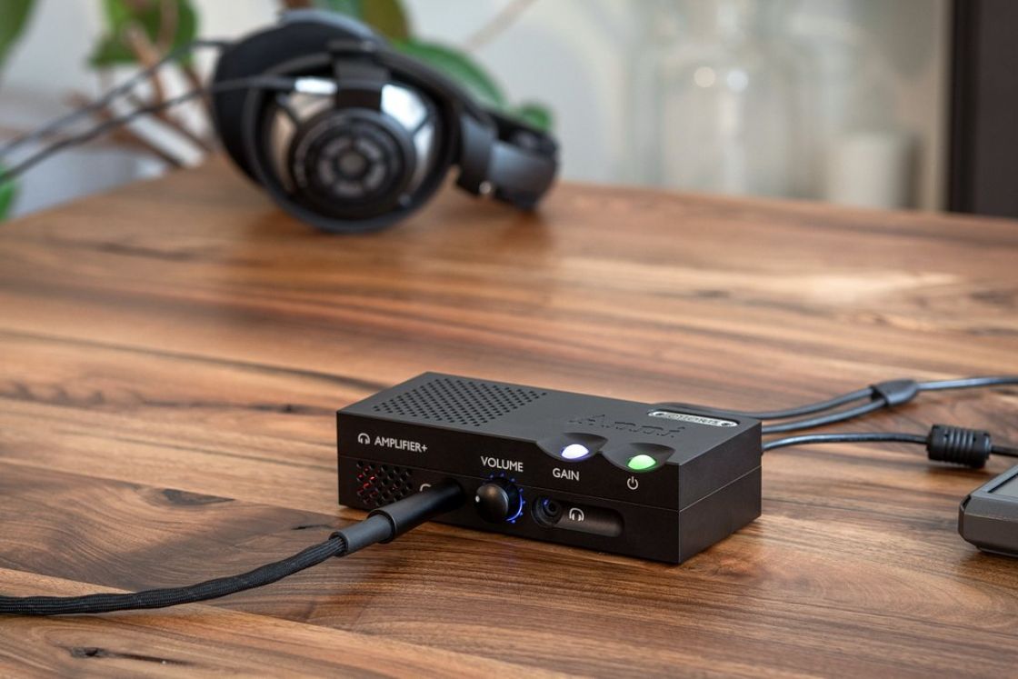 Chord Electronics Anni stereo amplifier showing a sleek black design with control knobs and input ports on the front panel.