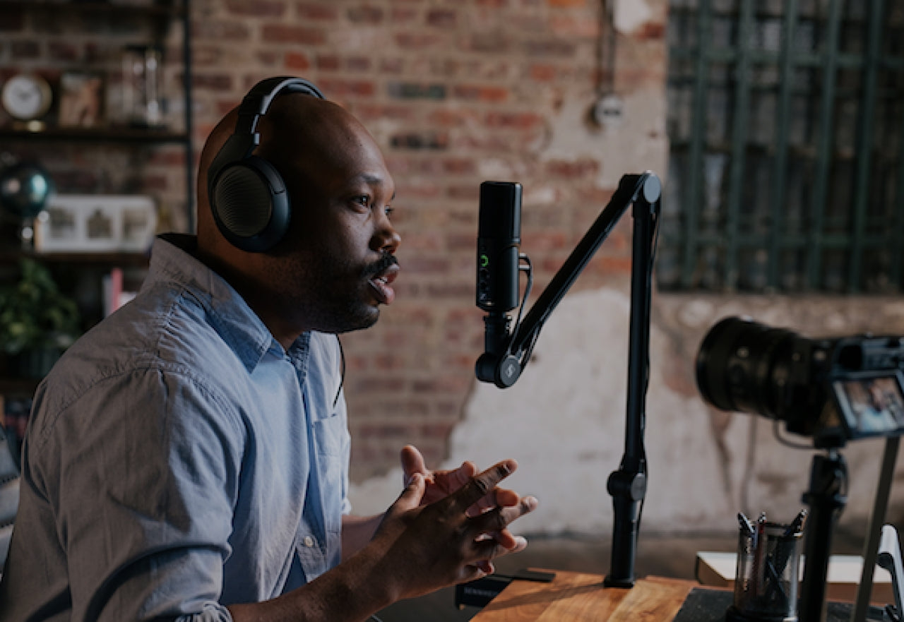 Sennheiser Profile USB-C microphone with sleek black design and adjustable stand, ideal for professional audio recording.