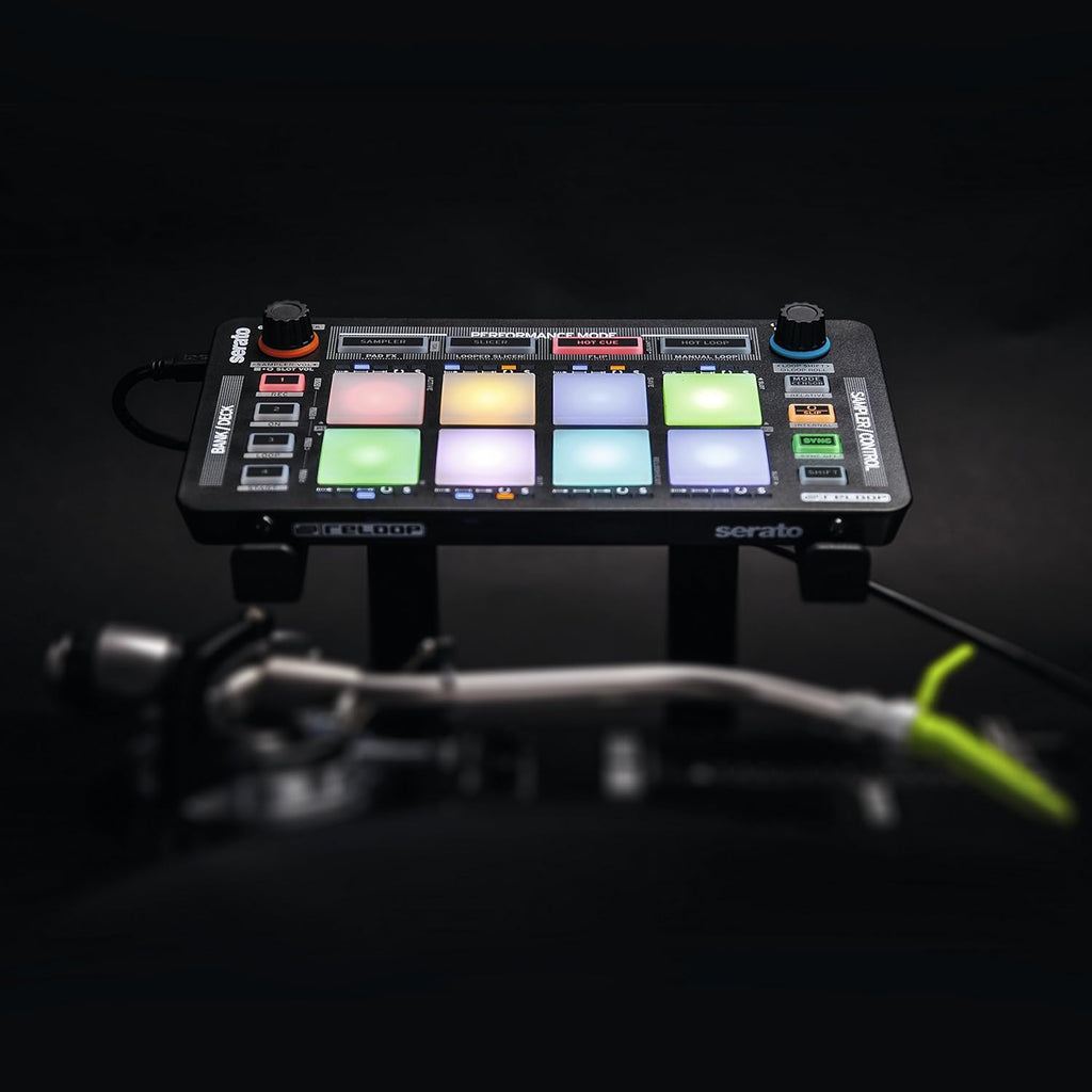 Reloop Neon DJ effects device with colorful LED lights and control knobs, designed for professional DJ setups.