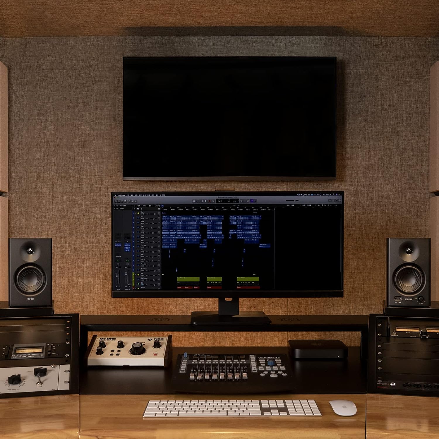 Edifier MR4 desktop speakers with sleek black design, featuring compact size and audio controls on the front panel.