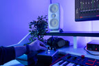 IK Multimedia iLoud MTM MK2 active nearfield monitors shown with front and side views, compact design, and control panel.