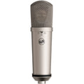 Warm Audio WA-87jr nickel condenser microphone shown from the front, featuring a sleek metallic finish and professional audio equipment design.