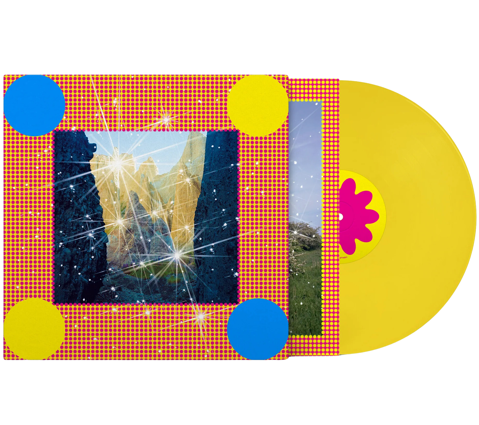 Yellow vinyl LP of Caribou's Honey album by City Slang, showing the colorful album cover art and record inside.