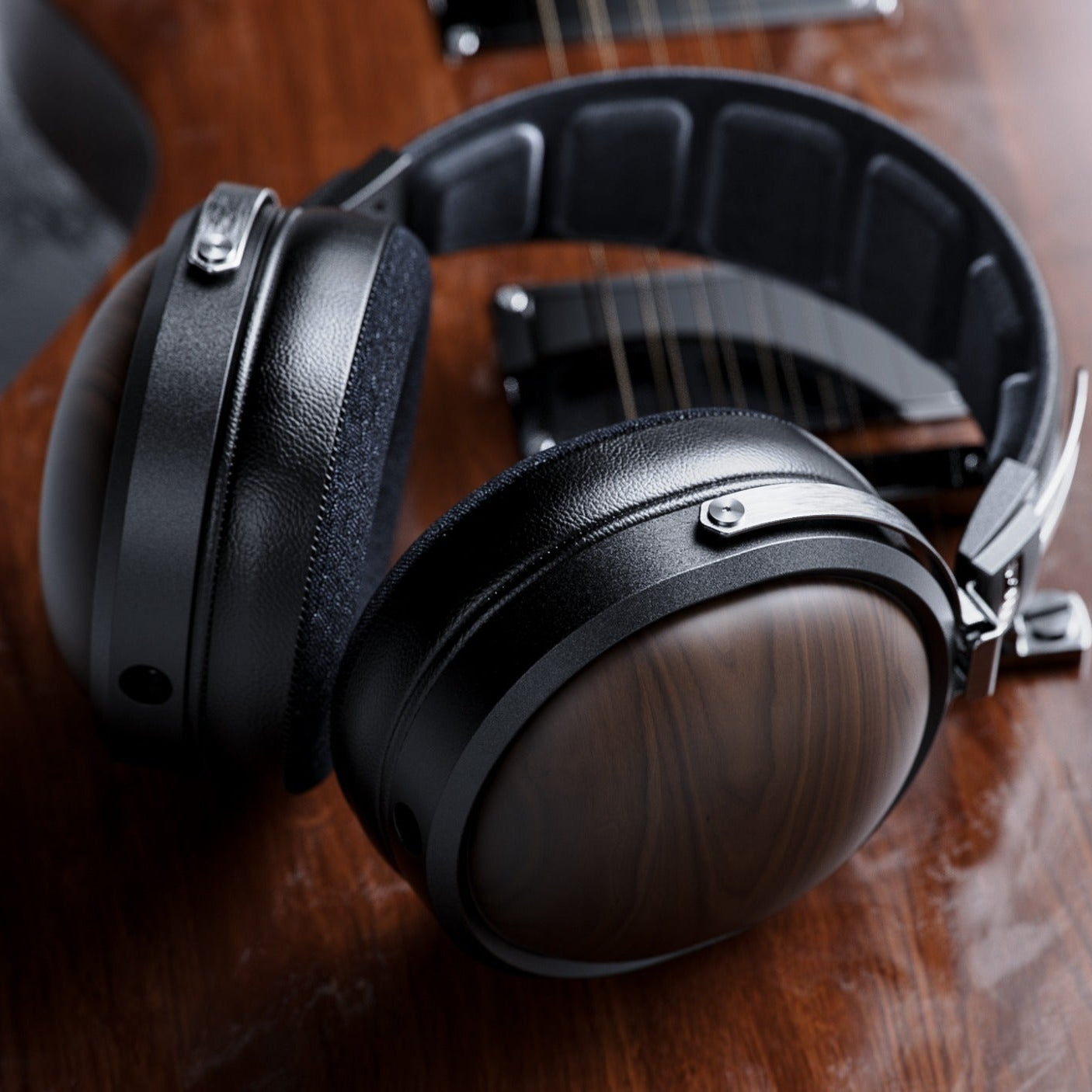 FiiO FT1 wired headphones with black earphones and inline remote, designed for high-quality audio listening.