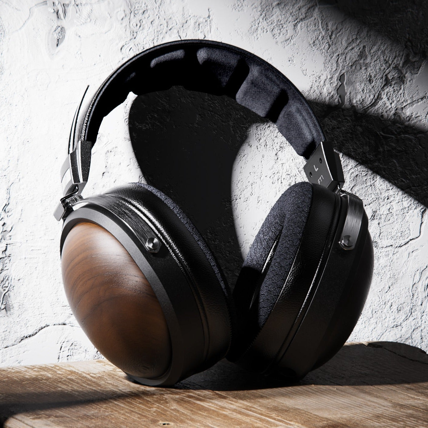 FiiO FT1 wired headphones with black earphones and inline remote, designed for high-quality audio listening.