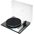 Rega Planar 3 Eco Special turntable with wooden plinth, tonearm, and platter, showcasing its sleek design and high-quality build.