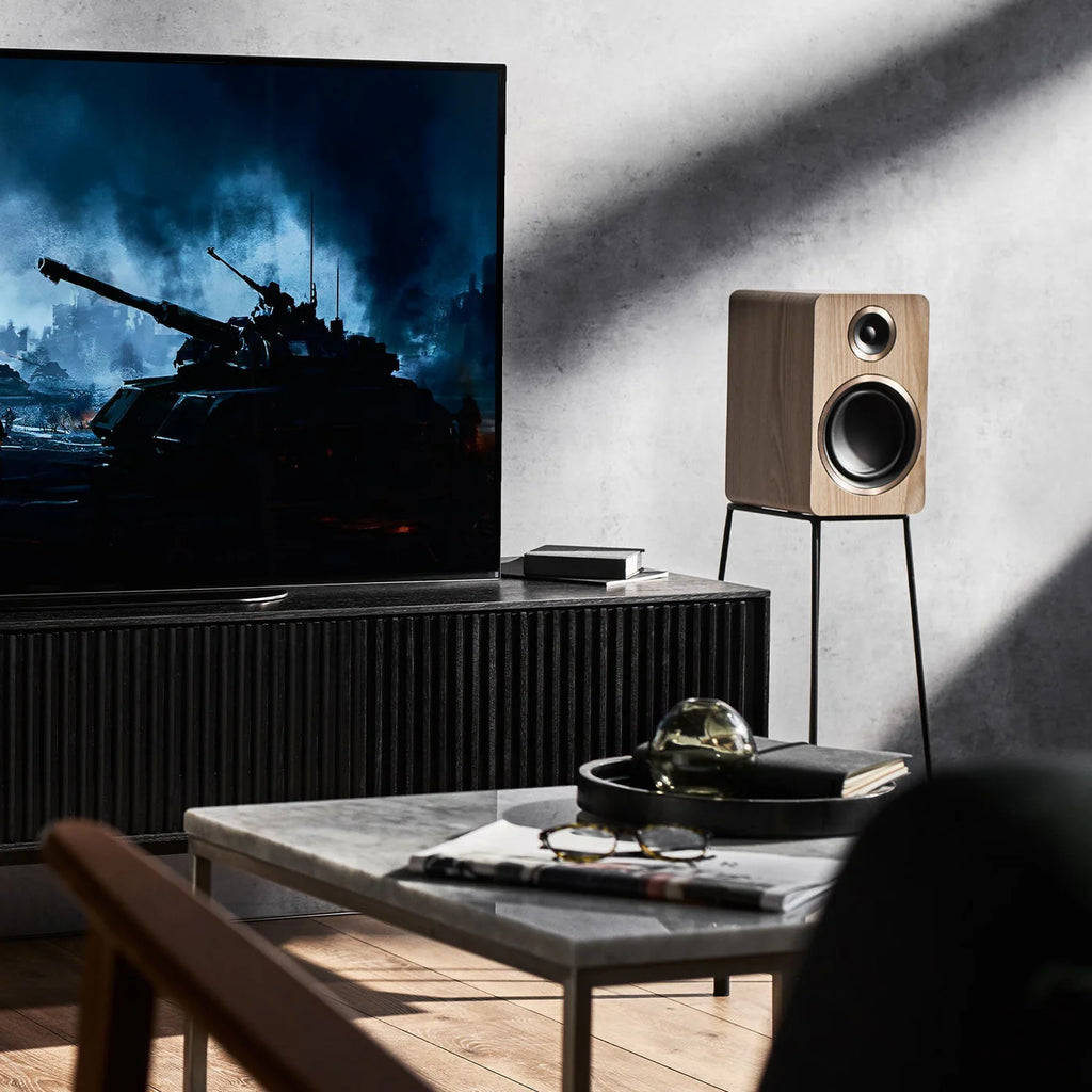 Argon Audio Fenris A5 active bookshelf speakers with black finish and modern design, featuring two speaker drivers and sleek appearance.