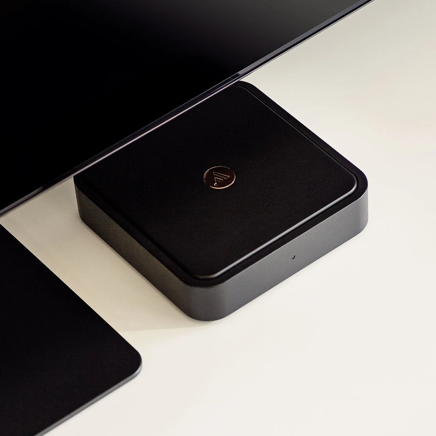 Argon Audio Solo music streamer black front view with display and control buttons, compact electronic device for streaming music.