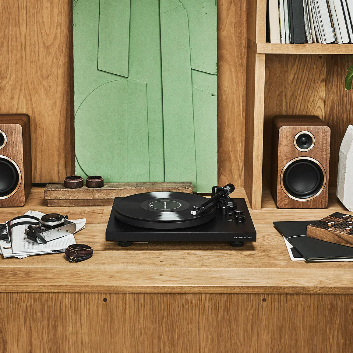 Argon Audio TT MK2 turntable in black with sleek design, tonearm, and platter for high-quality vinyl listening.
