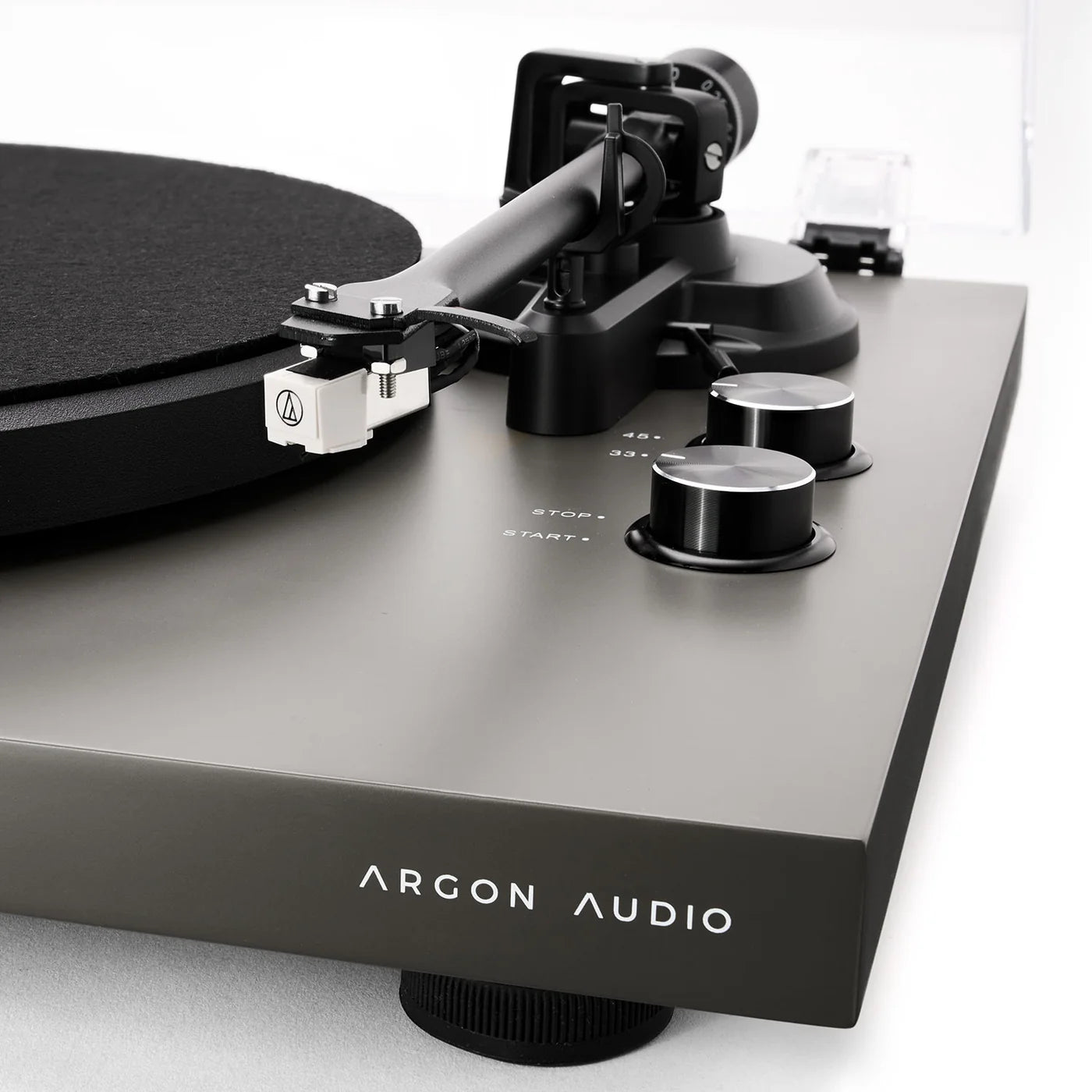 Argon Audio TT MK2 turntable with wooden plinth, tonearm, and vinyl record playing on a modern audio setup.