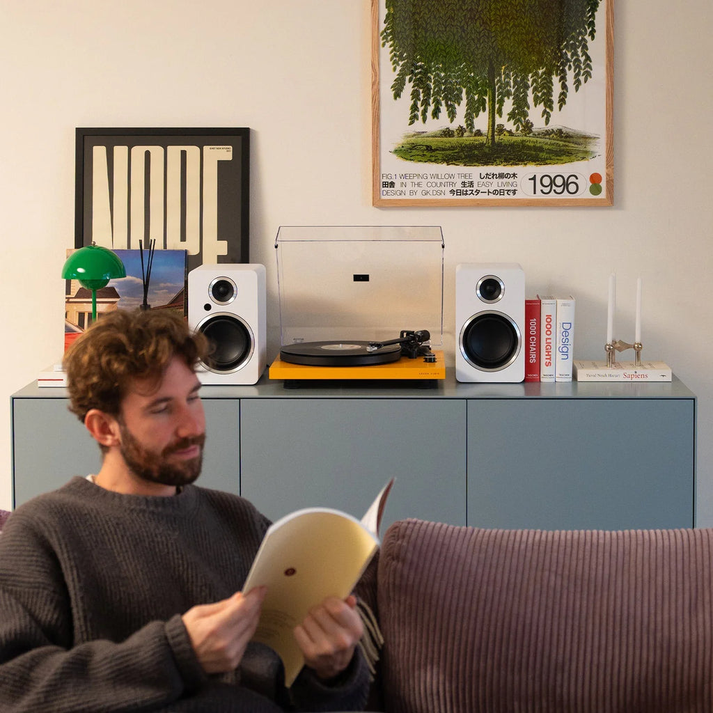Argon Audio Fenris A5 active bookshelf speakers with white finish, featuring sleek design and speaker drivers visible from the front.