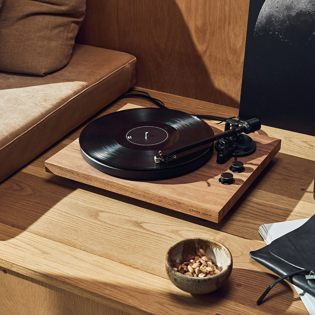 Argon Audio TT MK2 turntable with sleek design, featuring a tonearm and platter for high-quality vinyl playback.
