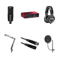 Audio-Technica AT 2020 Studio Bundle with microphone, accessories, and stand for professional recording and audio production.