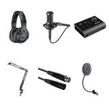 Audio-Technica ATH-M40x studio headphone bundle with headphones, accessories, and carrying case for professional audio use.