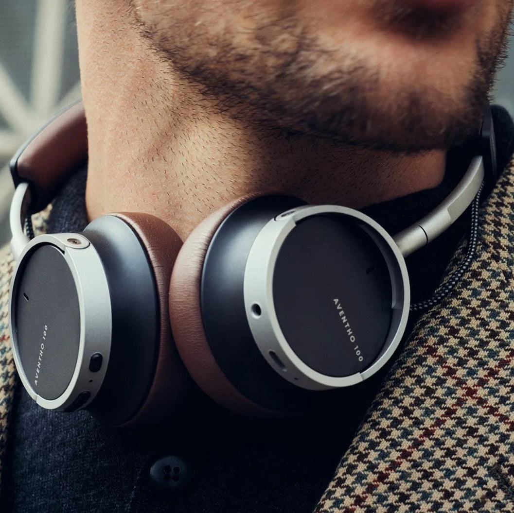 Beyerdynamic Aventho 100 wireless on-ear headphones with sleek design, shown in a vintage-inspired style image.