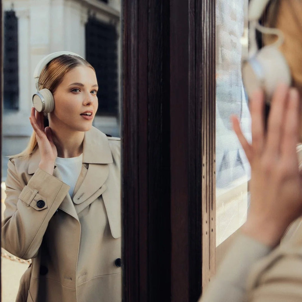 Beyerdynamic Aventho 100 wireless headphones with over-ear design and sleek black finish, shown in a close-up view.