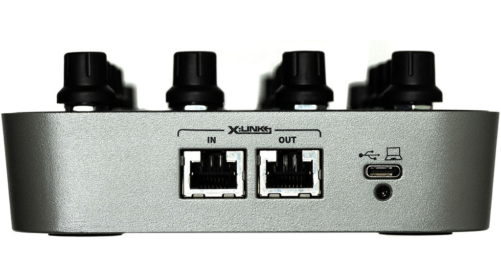 Allen & Heath Xone:K3 DJ controller with jog wheels, mixer faders, and control knobs for professional DJ setup.