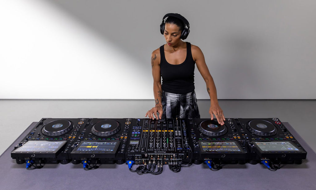 AlphaTheta CDJ-3000X DJ media player with large touchscreen, jog wheels, and professional controls for DJ performance.