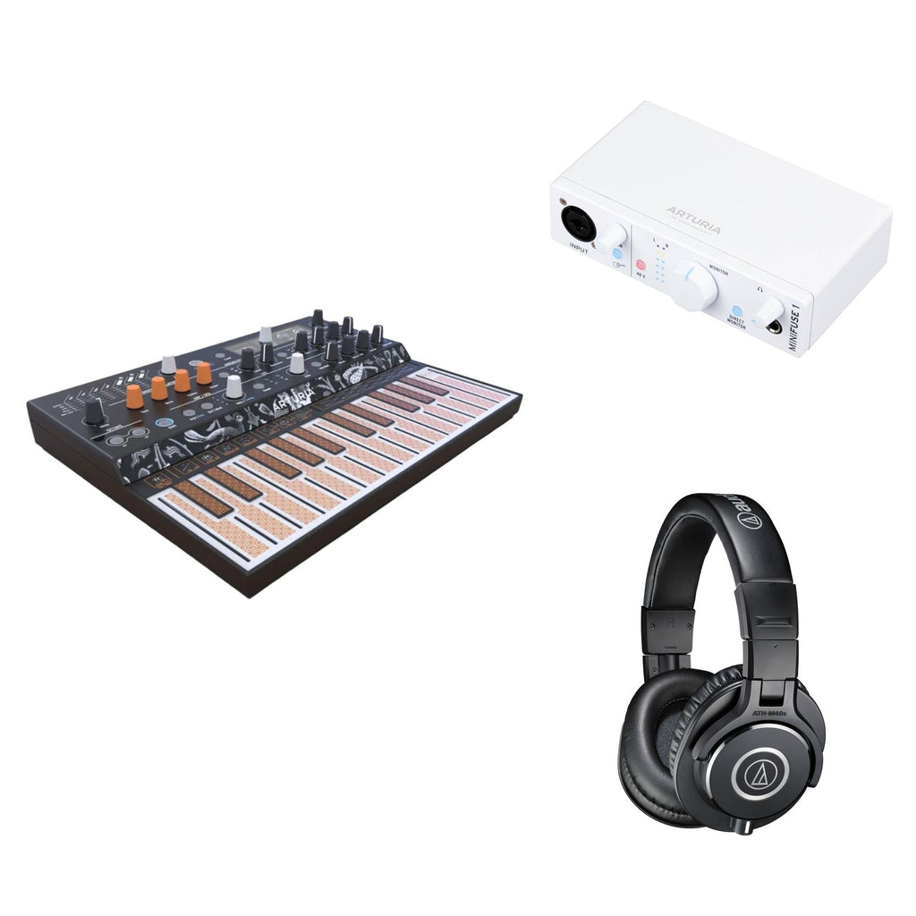 Arturia MicroFreak keyboard bundle with accessories for home studio setup, featuring compact digital synthesizer and musical production tools.