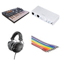 Arturia MicroFreak Producer Kit featuring a compact keyboard, MIDI controller, and accessories for music production.