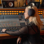 Audeze LCD-S20 studio headphones with large ear cups and adjustable headband, designed for professional audio monitoring.