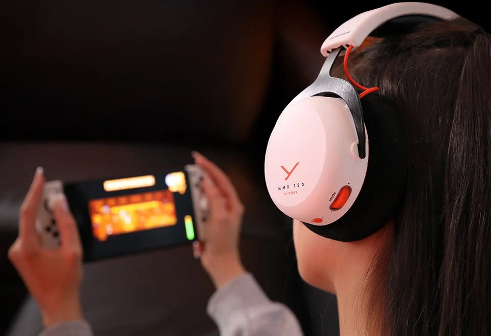 Beyerdynamic MMX 150 Wireless gaming headphones with over-ear design, microphone, and adjustable headband for immersive gaming.
