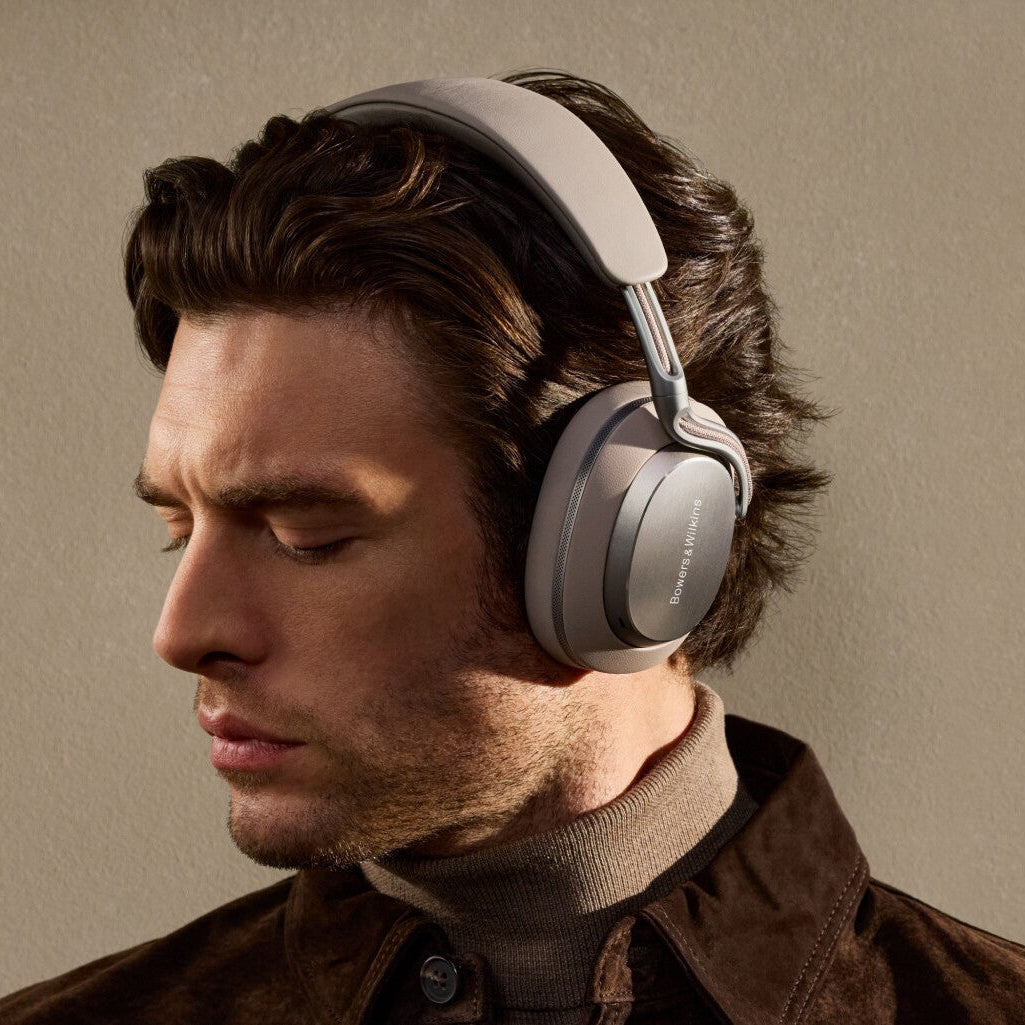 Bowers & Wilkins Px8 S2 wireless headphones with sleek black design and plush ear cushions, showcasing premium audio quality.