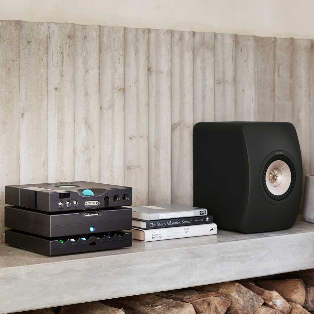 Black Chord Electronics Hugo TT2 headphone amplifier and DAC with sleek design and detailed front panel controls.