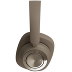 DALI iO-12 wireless headphones in mocha grey with sleek over-ear design and padded ear cushions.