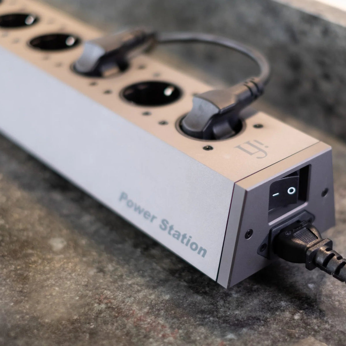 SilentPower PowerStation power supply with multiple ports and a sleek design, showcased in a well-lit environment.