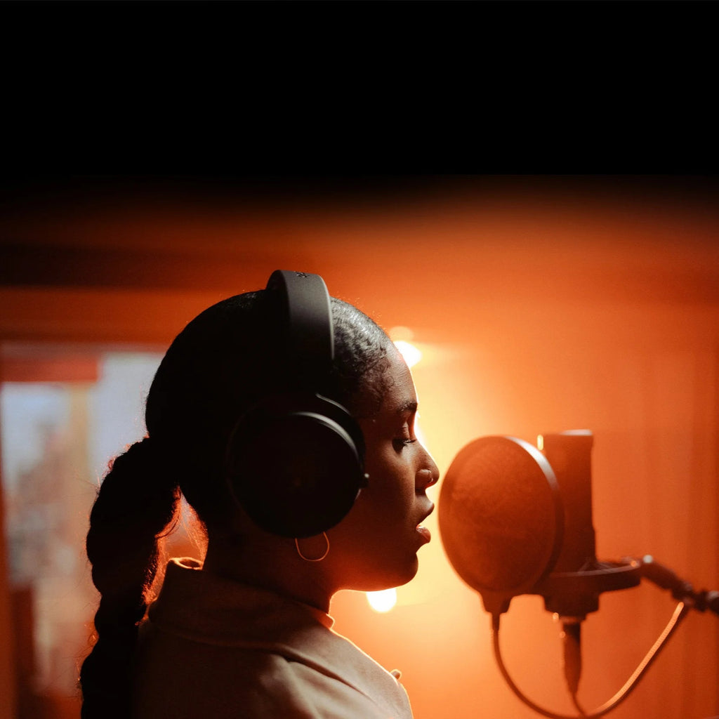 Beyerdynamic DT 700 Pro X studio headphones with over-ear design and adjustable headband, black color, and padded ear cups.
