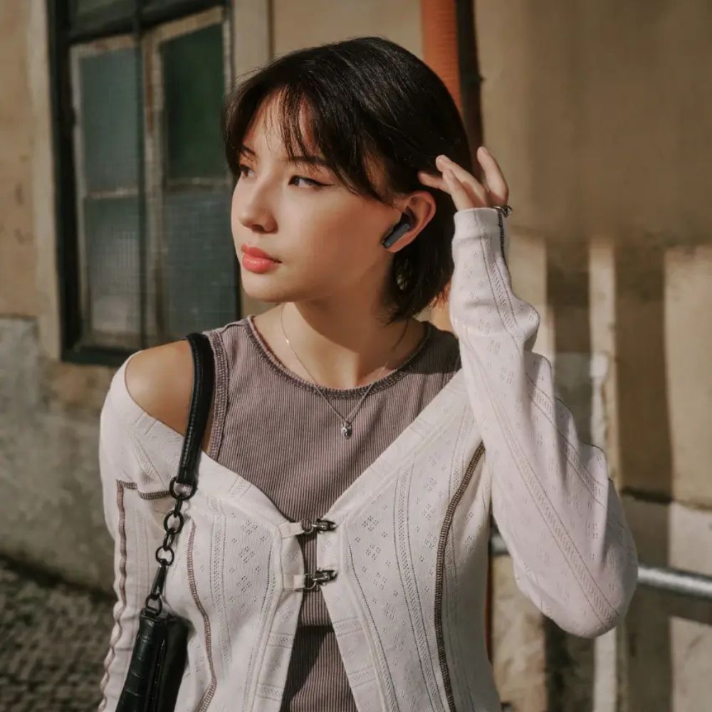 Sennheiser Accentum Open wireless in-ear headphones with sleek black design and ergonomic earbuds for comfortable listening.