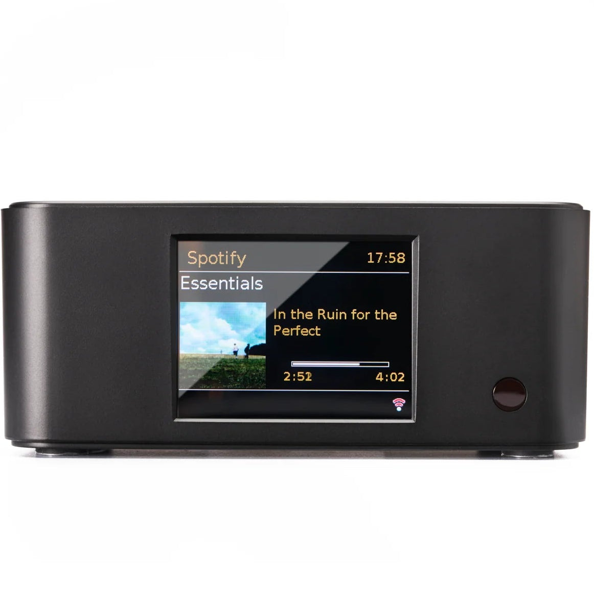Essentials Stream Connect music streamer in black, compact device with control buttons and ports for seamless audio streaming.