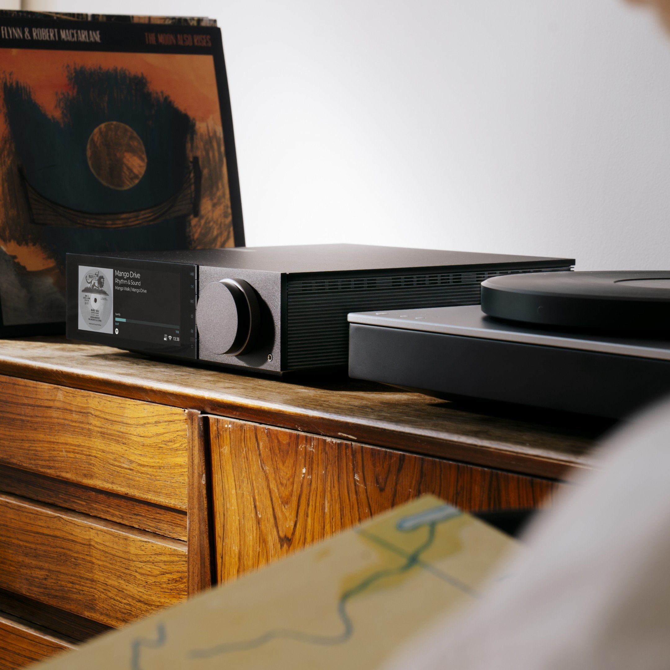 Cambridge Audio Evo 150 SE music streamer showing front panel with display and control buttons.