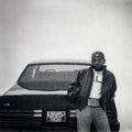 Black vinyl LP of Kendrick Lamar's GNX album by Interscope Records, featuring the album cover and record details.