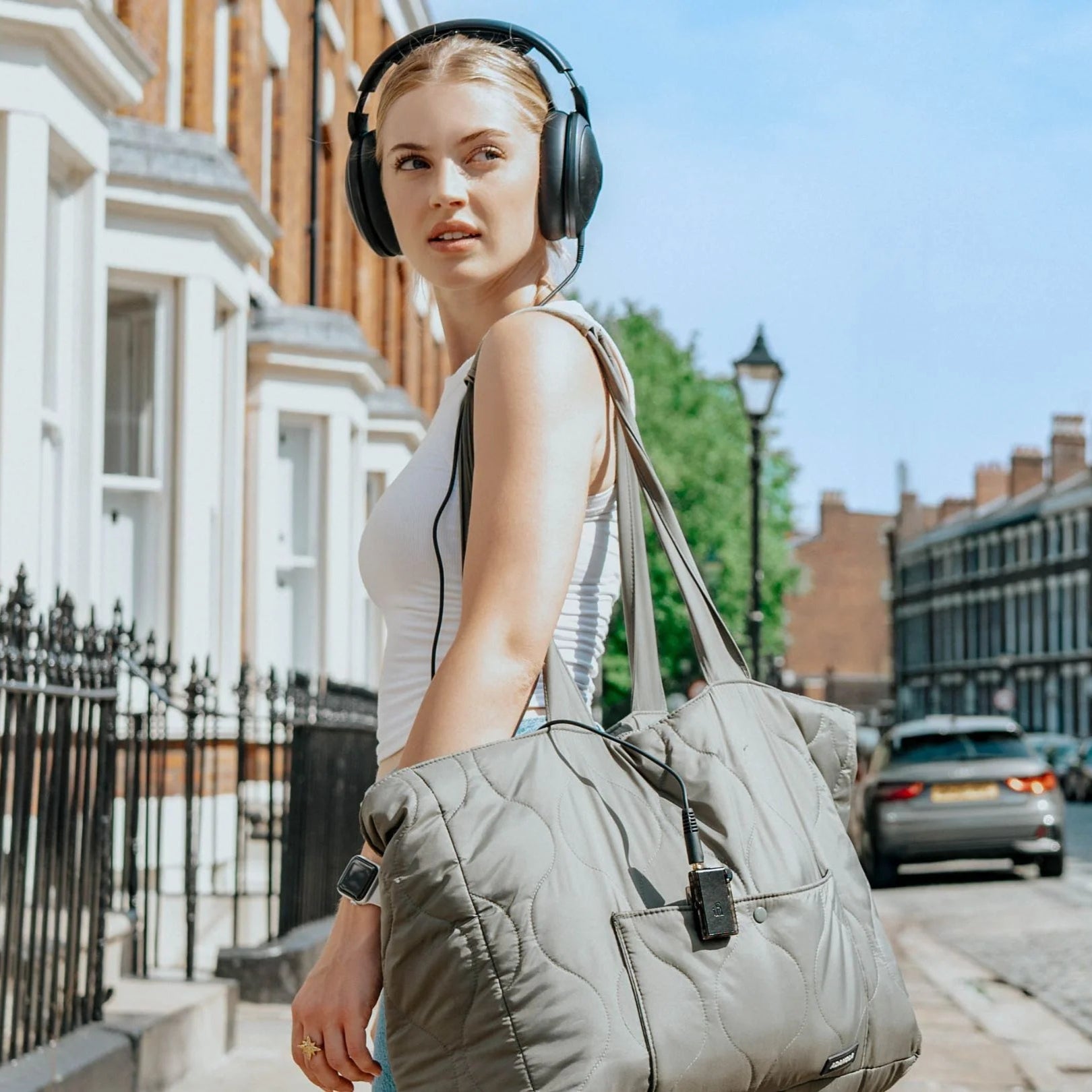 iFi Audio Go Blu Air headphone amplifier and DAC, compact black device with controls and ports, designed for high-quality audio.