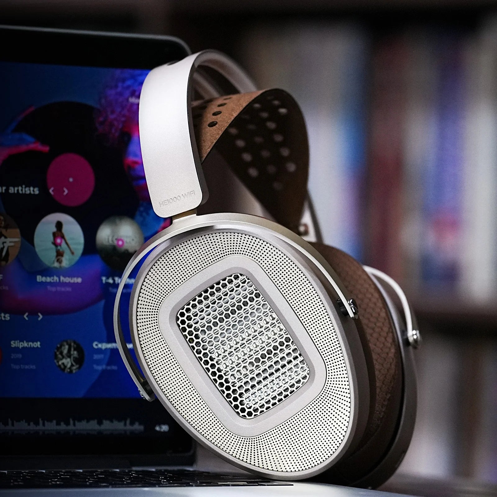 HiFiMAN HE1000 WiFi wireless headphones with sleek black ear cups and headband, designed for high-fidelity audio.