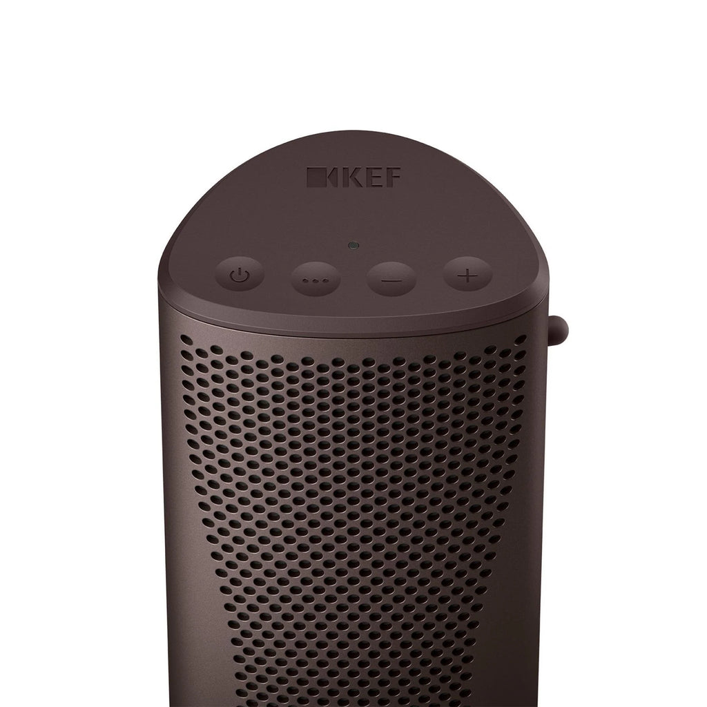 KEF Muo portable speaker in cocoa brown with top control buttons and sleek design, ideal for on-the-go audio.