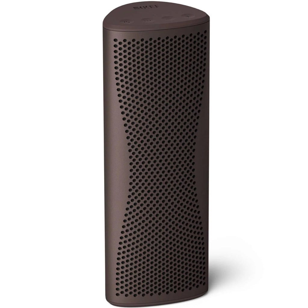 KEF Muo portable speaker in cocoa brown with a sleek top and side view, showcasing its compact, modern design.