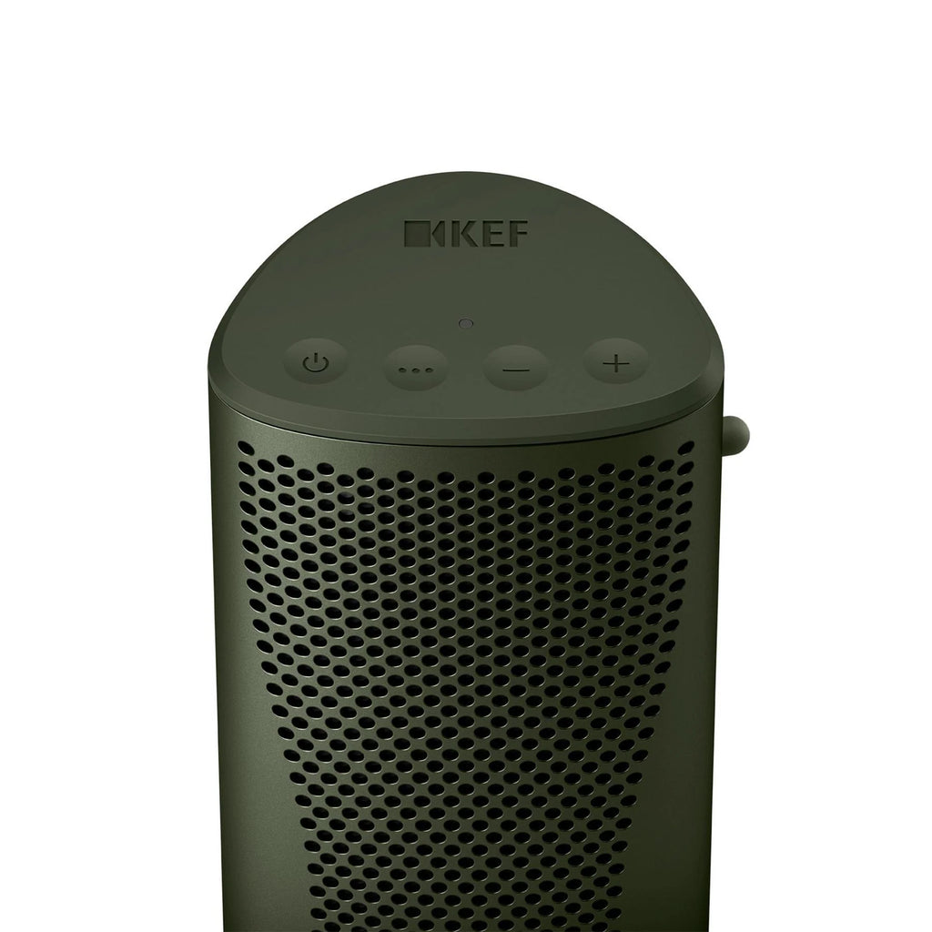 KEF Muo portable speaker in moss green with top control buttons and sleek compact design.