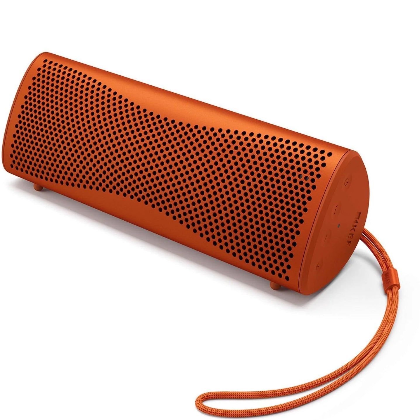 KEF Muo portable speaker in vibrant orange with a sleek, compact design and textured fabric exterior.