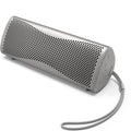 Silver KEF Muo portable speaker with a sleek cylindrical design and textured surface, ideal for high-quality music on the go.