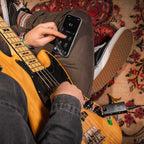 IK Multimedia Tonex Plug interface showing software dashboard with audio controls and virtual guitar amp presets.