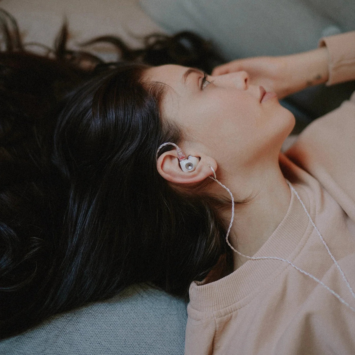 Meze Audio Alba in-ear headphones with black and silver design, showing the sleek earbuds and cable on a white background.
