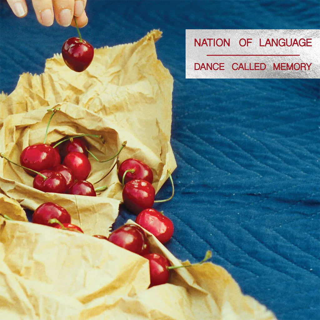 Nation of Language dance called memory vinyl LP by Sub Pop featuring a white and red opaque corona design, showcasing the record's colorful label.